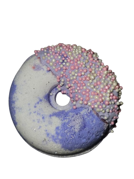 Bath Bomb Donut in Grape Fragrance with purple and pink Sugar candy decorative elements on a white background