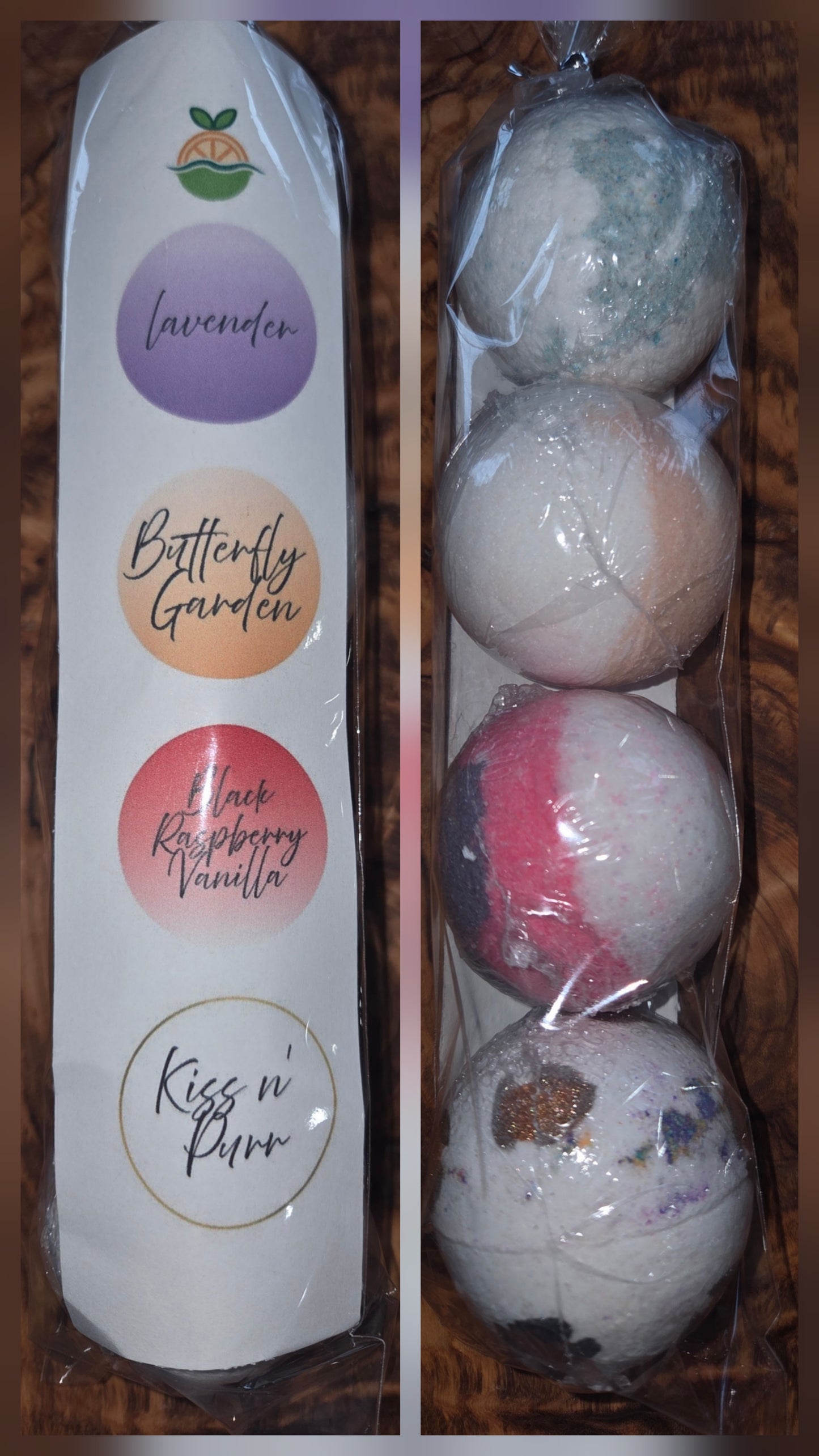 Packaging of 4 small bath bombs with scents listed: Butterfly Garden, Lavender, Black raspberry Vanilla, Kiss n Purr  fragrances 