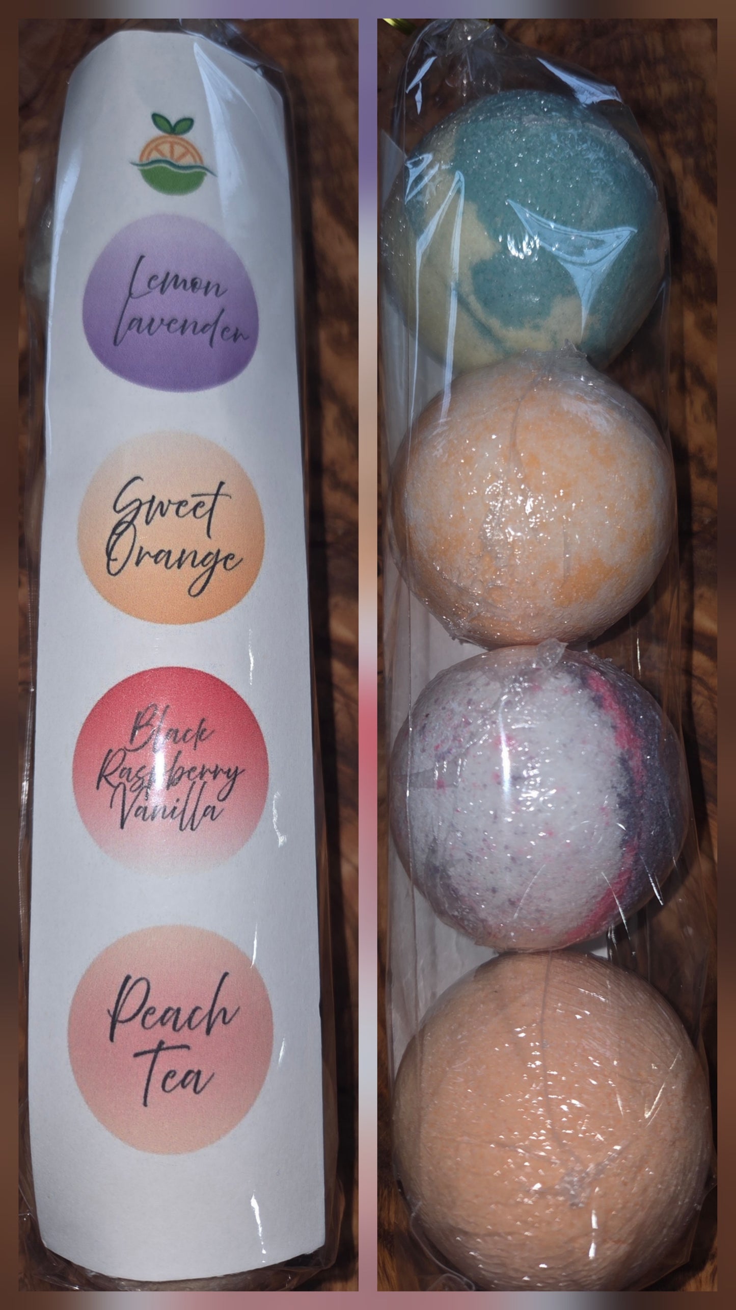 Packaging of 4 small bath bombs with scents listed: lemon lavender. Sweet Orange, Black raspberry vanilla, peach Tea 