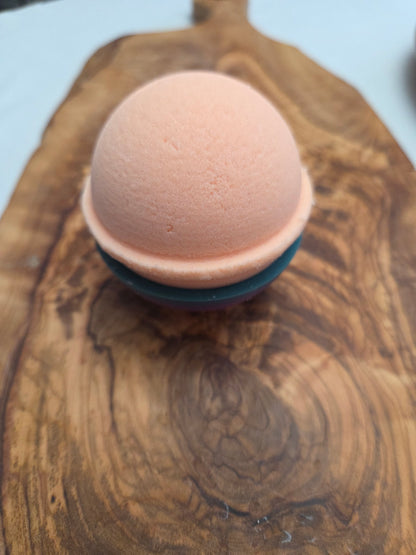Orange  bath bomb,Peach teas Fragrance on a wooden surface to show